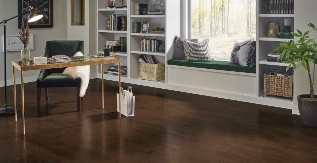 glamourous home office with dark hardwood floors and emerald green accents